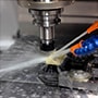 Milling machine with metalworking cutting oil