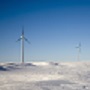 Wind tower on snowy field