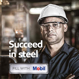 Mobil worker in a factory with his arms crossed, with the supporting copy - Succeed in steel